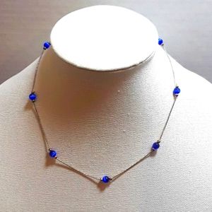 Cat's eye beads and silver necklace